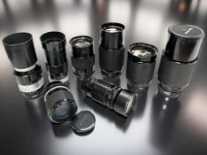 A collection of vintage zoom / telephoto lenses to include Nikkor-Q Auto 1:3.