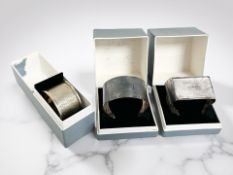 Three boxed silver napkin rings CONDITION REPORT: 67g