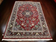 A Kashan rug, Central Iran, 253 cm x 169 cm.