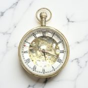 A gilt-metal and glass 'pocket watch' paperweight,