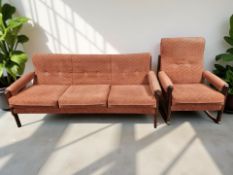 A 20th century teak framed three seater settee,