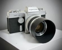 A Topcon RE-2 35mm film camera with RE.Auto-Topcor 1:1.8 f=5.8cm lens.