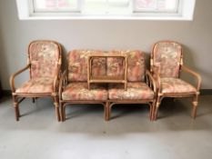 A four piece bentwood conservatory suite comprising a two seater settee,