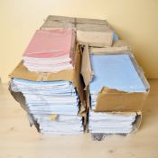 A large quantity of A4 blank exercise books.