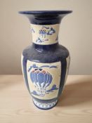 A large earthenware baluster vase, height 52 cm.