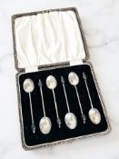 A set of six silver coffee spoons