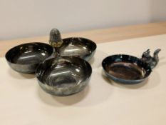 A silver-plated nut dish surmounted by a squirrel, diameter 11 cm,