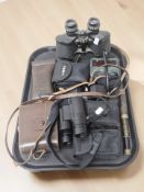 An Agfa camera, pair of Boots 10x50 binoculars, other modern pairs of binoculars,