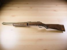 An American air rifle signed 'Benjamin Franklin, made in USA, Cal 22, Model 342', length 89 cm.