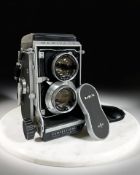 A Mamiya C3 Professional TLR medium format film camera, with Mamiya-Sekor 1:3.5 f=105mm lens.