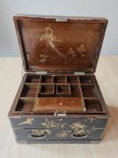 A Japanese Meiji period lacquered table box, width 34 cm.