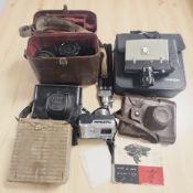 A group of cameras including Zenit, Sankyo, Olympus, a Kestrel 8mm and 6mm film splicer,