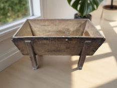 A 19th century stained pine grain bin, 124 cm W x 60 cm D x 75 cm H.