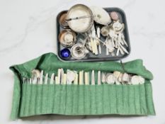 A collection of silver plate including various cutlery, basket,