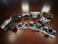 A collection of 35mm film cameras to include Mamiya NC1000s (body only), Yashica TL-Electro,