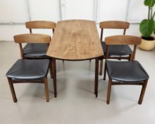 A teak drop leaf dining table, length 114 cm,