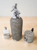 A vintage soda siphon,