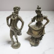 A pair of bronze figures of a lady and gentleman in 18th century attire,