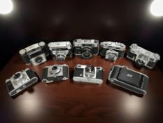 A collection of 35mm film cameras to include two Soviet Kiev examples, Kodak Retinette 1,