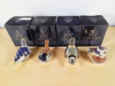 Four Royal Crown Derby porcelain bird paperweights to include chaffinch, bluetit,