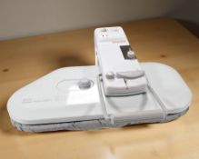 A Singer Magic steam press CSP-1.