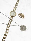 A 9ct gold signet ring, a lady's 9ct gold Zenith wristwatch on integral gold-plated bracelet,