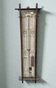 An Admiral Fitzroys barometer, in stained oak case, height 105 cm.