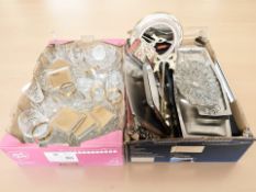 Assorted stainless steel serving trays, boxed sets of silver plated placemats,