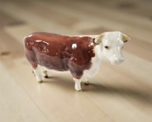 A Beswick Hereford cow CH. of Champions.