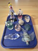 A Murano glass clown and various studio glass paperweights.