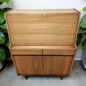 A Remploy teak bureau, 92 cm x 41 cm x 107 cm.