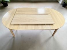 ** Lot withdrawn from sale** A Neptune 'Sheldrake' light oak extending dining table,