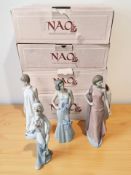 Four Nao figures, No. 1233, 1205, 1216 and 1215, all boxed.