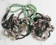 A collection of jade, pearl and amethyst jewellery.