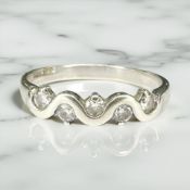 A 9ct white gold five stone diamond ring, size O CONDITION REPORT: 2.