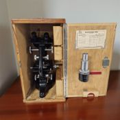 A Watson & Sons, Barnet, 'Bactil' microscope, in fitted wooden case with various lenses, with key,