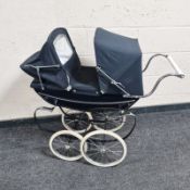 A Silver Cross pram.