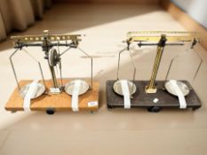 A set of Griffin & George Bakelite and brass balance scales, and a further set of scales,