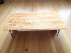 A pine low coffee table on metal hairpin legs, 120 cm x 65 cm x 35 cm.