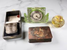 A cased silver napkin ring, together with a 19th century lacquered papier mache trinket box,