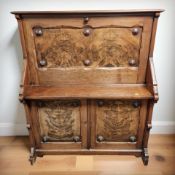 A Victorian figured walnut fall front secretaire cabinet,