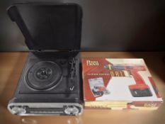 A Powerdevil drill in box, and a retro style music system.