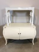 A contemporary painted two door bombe chest, width 136 cm,