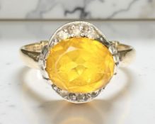 A 9ct gold citrine and paste ring, size P CONDITION REPORT: 3.