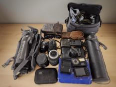Vintage and modern cameras including a Fujifilm Finepix S 14 megapixel camera,