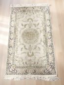 A Kashmir silk-piled rug,