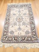 A machine made Isfahan rug, 195 cm x 110 cm.