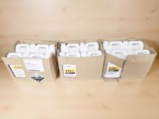 Twelve 5-litre bottles of Sealocrete concrete surface-treating fluid.