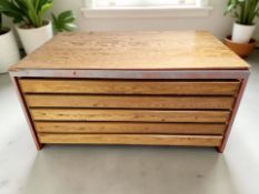 A 20th century pine and metal framed four drawer plan chest, 150 cm x 100 cm x 72 cm.