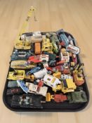 Assorted playworn die cast models including Dinky and Corgi, Thunderbirds, delivery vehicles, crane,